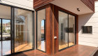 interior photography of West Footscray townhouse new development, architectural design, solid wood floor, white walls, roger thompson photography, living area, alfresco