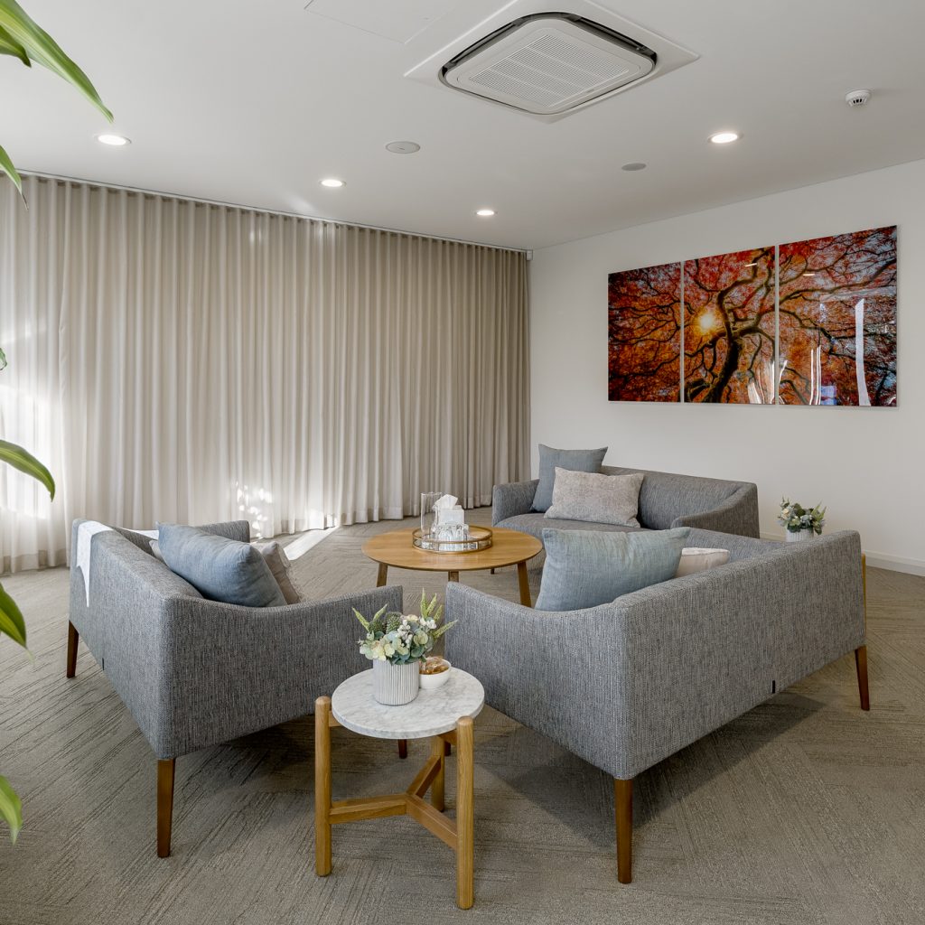 Le Pine and white lady funeral home family meeting room internal photo showing seating area by Roger Thompson Photography Melbourne