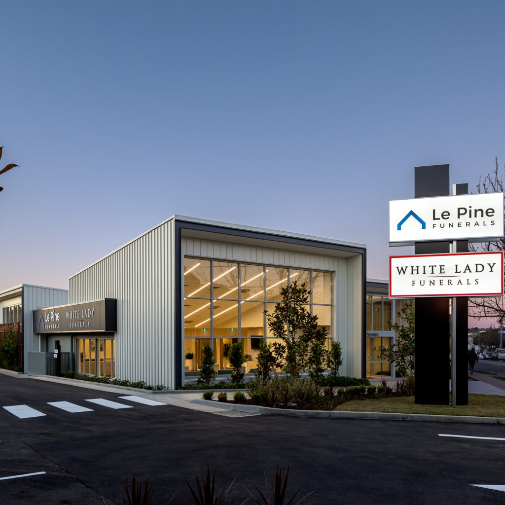 Le Pine and white lady funeral home  front view dusk exterior photo by Roger Thompson Photography Melbourne