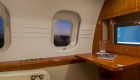 Bombardier Global XRS private jet internal flight attendant seating photo