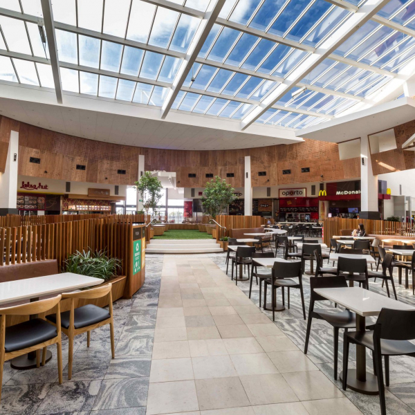 Highpoint Shopping Centre Food Court area by Ramvek Shop fitting showing seating area and glass roof with blue sky